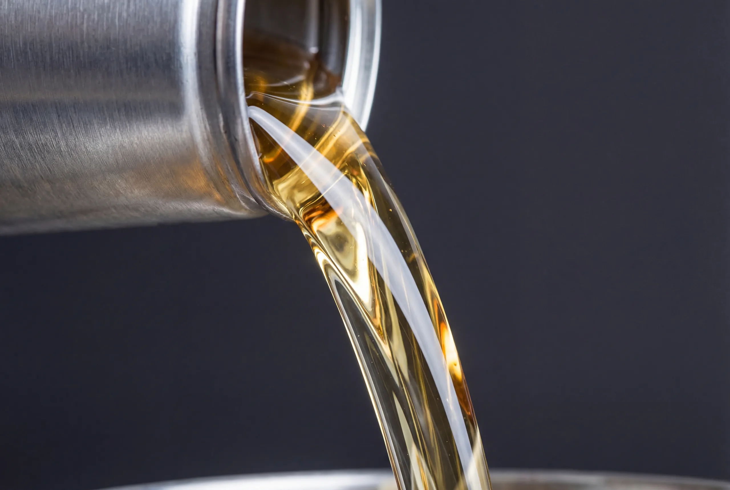 Specialty base oil refining and industrial lubricant production